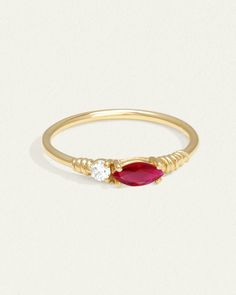 Celebrate new beginnings with our red toi et moi ring in solid gold with marquise ruby & round lab diamond. Shop coloured gemstone promise rings. Marquise Ruby Ring With Center Stone For Promise, Marquise Red Diamond Ring, Marquise Cut Ruby Ring For Promise, Red 14k Gold Marquise Ring, Red Marquise Cut Gemstone Birthstone Ring, Red Marquise 14k Gold Ring, Red Marquise Birthstone Ring For Anniversary, Marquise Ruby Birthstone Ring, Red Marquise Diamond Ring Fine Jewelry