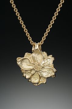 Gold Necklace - A little piece of nature you can bring with you always, this delicately detailed poinsettia pendant is carved from wax and cast in luxe 18k gold or sterling silver. <br><br>18 gold or sterling silver cable chain. Lobster clasp. Carved 14k Gold Jewelry, Elegant Hand Cast Jewelry For Anniversary, Luxury Carved Yellow Gold Necklaces, Luxury Carved Gold Necklace, Luxury Carved Gold Jewelry, Carved Yellow Gold Necklace Perfect For Gift, Carved Yellow Gold Necklace For Gift, Elegant Hand-cast Pendant Necklace, Carved Yellow Gold Necklace