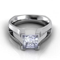 a white gold ring with a princess cut diamond