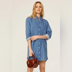 Details The Chambray Lightweight Denim Shirt Dress Features A Button-Down Collar, Relaxed Cuffs And A Slightly Curved Hem. An Oversized, Youthful Take On The Classic Shirt, It's The Perfect Shade And Made From Super Soft 100% Cotton So That It's Easy To Wear For All Seasons. Wear It Alone Or Unbuttoned As A Tunic Over A Turtleneck And Pants. Medium Wash Button Closure Shirt Dress For Spring, Spring Medium Wash Shirt Dress With Button Closure, Spring Denim Blue Shirt Dress With Button Closure, Spring Denim Shirt Dress With Button Closure, Spring Light Wash Shirt Dress With Button Closure, Denim Blue Denim Dress With Buttons For Daywear, Denim Dress With Buttons For Daywear, Denim Blue Dress With Buttons For Daywear, Casual Indigo Denim Dress With Button Closure