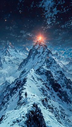 a man standing on top of a snow covered mountain under a star filled night sky