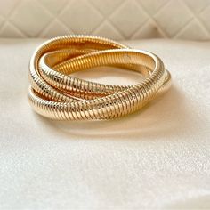 Three Wrap Spiral Bracelet, 18k Gold Plated. Never Used Fast Shipping. Must Have For This Season. Offers Accepted. Modern Gold Bracelet As Gift, Modern Twist Gold Bracelet As Gift, Elegant Spiral Bracelet As Gift, Elegant Spiral Bracelet For Gift, Elegant Spiral Metal Bracelet, Elegant Gold Spiral Bangle, Slinky Bangle Jewelry As A Gift, Gold Flexible Slinky Bracelet, Gold Twisted Stackable Jewelry