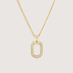 A gold chain and pendant, inspired by the interlinking of cufflinks, brings this necklace to life. As part of our Tailored Collection we studied all elements of suiting, and were fascinated by how a cufflink weaves itself through a button hole and connects to offer a practical yet beautiful finish. The oval pendant with diamond tracing hangs onto the chain with a hook that has a diamond at its center. The frame of the pendant measures 17mm and has 25 diamonds set within. If ordered in rose gold, the chain will be our Rollo chain. All features can be customized! Please contact us if you wish to make changes, we love making custom designs. All of our jewelry is carefully handmade in our atelier. *HC diamond are all conflict-free diamonds To order by phone 972-72-2991000 Gold Chain And Pendant, Chain And Pendant, Gold Chain With Pendant, Button Hole, All Elements, Oval Pendant, Conflict Free Diamonds, Creative Arts, Side View