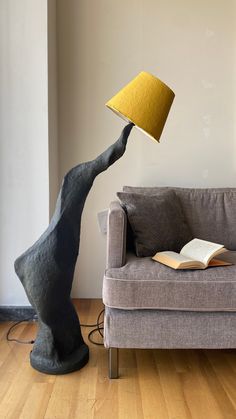 a lamp that is on top of a couch