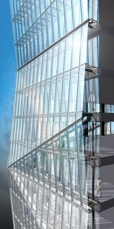 a tall glass building with lots of windows