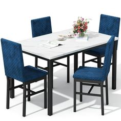 a dining table with blue chairs and a white marble top, set against a white background