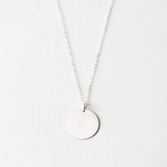 Our 16mm large-sized disk necklace, without personalization. A timeless piece to dress up or down. Simple Everyday Initial Pendant Necklace, Classic Everyday Round Charm Necklace, Everyday Large Medallion Pendant Necklaces, Everyday Round Disc Coin Pendant Jewelry, Minimalist Everyday Charm Necklace With Coin Pendant, Everyday Jewelry With Coin Pendant, Everyday Minimalist Charm Necklace With Coin Pendant, Everyday Necklace With Large Oval Pendant, Everyday Jewelry With Polished Round Pendant