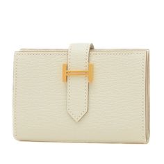 Used Hermes Bearn Bi-Fold Wallet Chevre Mushroom B Engraved (Sku: Gzl12pm1) === General === Brand : Hermes === Design === Type : Wallet (Bi-Fold) Gender : Women Material : Chevre Leather Color : White === Size === Size (Hxwxd) : 7cm X 10cm / 2.75'' X 3.93'' === Included Items === Accessories : Box Accessories Notice : Before Purchasing, Please Refer To The Images Of The Accessories Included With The Item. === Condition === Condition : Opened (Never Used) Ranking : Rank Ns Never Used / Display It Elegant Tan Wallets For Business, Beige Business Wallet, Elegant Tan Bifold Wallet, Elegant Beige Formal Wallet, Formal Cream Rectangular Wallet, Classic Cream Wallet For Formal Occasions, Elegant Tan Wallet For Formal Occasions, Classic Beige Wallets With Gold-tone Hardware, Classic Cream Wallet