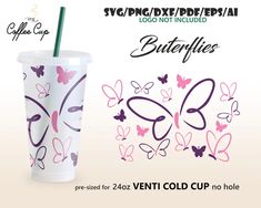 a paper cup with a straw in it and butterfly designs on the side, next to a