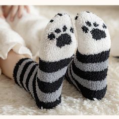 Unleash your inner feline with our Cat Paw Fuzzy Socks! Crafted for comfort and designed for fun, these socks transform your feet into cute cat paws, ensuring every step is filled with whimsy. Made with plush material, they offer unparalleled warmth and coziness, making them a must-have for those chilly days and nights. Whether you're a cat enthusiast or simply in search of unique, comfy socks, these are the purr-fect choice! Features: Material: Plush, fuzzy material for maximum warmth and comfo Cat Paw Socks, Paws Socks, Comfy Socks, Paw Design, Forest Cat, Cat Socks, 2023 Trends, Fuzzy Socks, Cat Claws