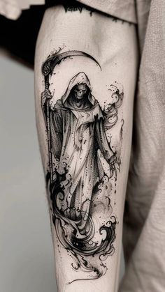 a man's leg with a tattoo on it that has an image of the virgin mary