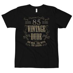 a black t - shirt that says 50 years vintage dude and has the legend on it