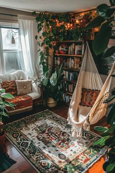 a living room filled with furniture and lots of plants