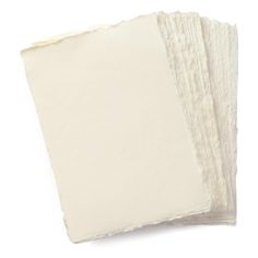 four pieces of white paper stacked on top of each other