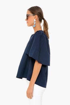 The Finley Flutter Sleeve Top is effortlessly chic. In a classic navy hue, this blouse has a flattering silhouette, oversized sleeves, and a v-neckline. Pair with gold accessories for everything from work to brunch this season.

V-neckline
Flutter sleeves
100% cotton
Care: Hand wash cold, hang to dry Bar Mitzvah Ideas, Oversized Sleeves, Oversize Sleeves, Summer Capsule, Studded Sandals, Flutter Sleeve Top, Gold Accessories, Bar Mitzvah, Flutter Sleeves