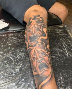 a man with a tattoo on his arm