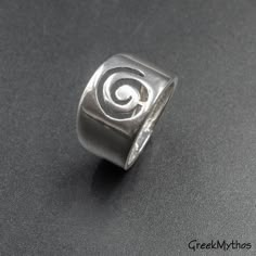 Wide Band Sterling Silver Spiral Ring, Unisex Infinity Symbol Statement Ring, Handmade Greek Jewelry, Men's Jewelry Inspired by the ancient Greek spiral infinity symbol. A meaningful statement gift that is supposed to provide good luck and long life upon the wearer. 925 Sterling silver ring bandwidth degrading from 13 to 6 mm wide Hallmarked 925 onto the inside of the ring This is more of my Greek Jewelry collection http://www.etsy.com/shop/GreekMythos?section_id=8103459 and Here you may find mo Goddess Jewelry, Spiral Ring, Wide Band Ring, Art Necklaces, Greek Jewelry, Dorian Gray, Art Pendant, Geometric Necklace, Wide Band Rings