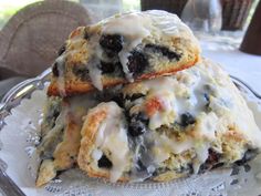 two blueberry scones stacked on top of each other