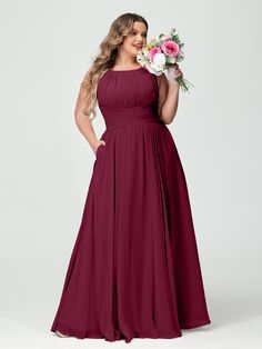 a woman in a long burgundy bridesmaid dress with her hands on her hips