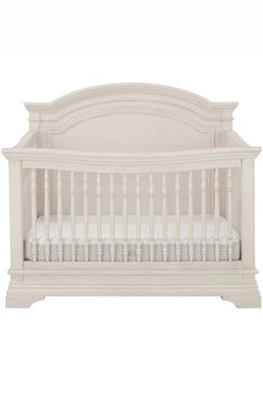 a white crib that is on display