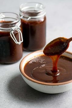 a spoon full of caramel chutney sauce