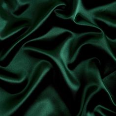 Hunter bridal satin fabric offers a beautiful smooth medium weight 100% polyester shiny satin material and popular for wedding dresses, gowns, apparel, fashion, and event decor. Bridal satin is an affordable option for table linens, draperies, chair covers, sashes, napkins, embroidered fabric, fashion, children's wear, crafts, and much more. Sold wholesale in a 70 yard roll. Color can vary by dye lot or batch. Emerald Green Swatch, Dark Green Eucalyptus, Green Silk Aesthetic, Satin Colors Fabric, Color Asethic, Hunter Green Aesthetic, Deep Green Aesthetic, Phtalo Green, Emerald Green Aesthetic