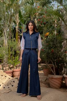 Denim Top with Bell Bottom Pants, Denim Two Piece Suit, Denim Jumpsuit Women, Puffy Sleeve, Blue Co ord Set, Crop Top with Wide Leg Pants Fabric - Denim  Sleeve - 3/4 Sleeves Work - Embroidery Work Color - Denim Shirt / Top Length - 20 Buttom Length - 39 Size - (XS), (S), (M), (L), (XL), (2XL) This outfit is a two-piece set designed for women. The top is made of denim and has net fabric sleeves that go up to about three-fourths of the arm length. It's paired with wide-leg pants, creating a coord Denim Cord Set Women, Denim Cord Set, Blue Denim Outfits For Women, Western Co Ord Sets Women, Denim Coord Set Women, Western Pants For Women, Fitted Denim Sets For Spring, Fitted Blue Denim Sets, Spring Denim Fitted Sets