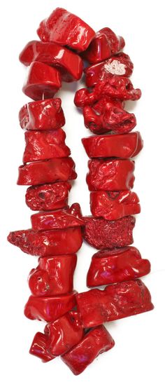 red gummy bears are stacked up on top of each other