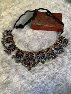 Handmade Banjara Mirror Necklace, Beautiful Multicolor Mirror Work, And Thread work, Antique Silver Look-Alike Necklace for Women, Add charm and charisma to your beautiful personality with these beautifully designed and handcrafted Brass necklace. The antique finish gives this Necklace a very eye-catching look. The Necklace is also designed beautifully and compliments the Necklace very well. Wear it with any of your formal or casual outfits and grab compliments all the way! Multicolor Necklace With Intricate Design For Ceremonial Occasions, Ceremonial Multicolor Necklace With Intricate Design, Traditional Multicolor Necklace With Intricate Design, Multicolor Cutdana Temple Jewelry Necklace, Bohemian Multicolor Mirror Work Jewelry, Bohemian Kundan Necklace With Mirror Work, Multicolor Oxidized Kundan Necklace For Festivals, Multicolor Bohemian Kundan Necklace, Multicolor Kundan Necklace With Oxidized Finish For Festivals