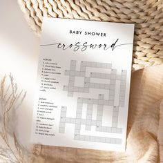 a baby shower crossword game on a blanket