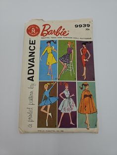 an old fashion book with pictures of women's dresses from the 1950's