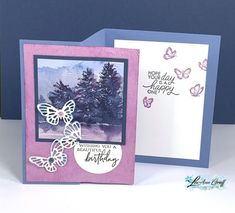 two cards with butterflies on them, one is purple and the other is white