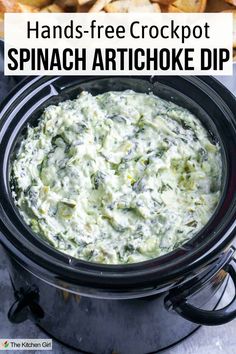 Spinach artichoke dip in a black slow cooker. Title? Hands-free Crockpot Spinach Artichoke Dip Crockpot Spinach Artichoke Dip, Crockpot Spinach, Dip Recipes Crockpot, Best Spinach Artichoke Dip, Small Slow Cooker, Spinach Artichoke Dip Recipe, Crock Pot Dips, Homemade Dips