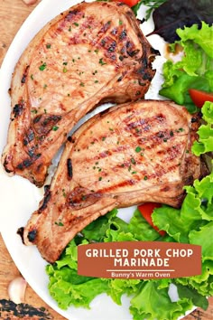 Two Grilled Pork Chops sitting on a white dinner plate garnished with greens. Grilled Pork Chop Marinade, Pork Chops Marinade, Pork Chops Tender, Pork Chops Grilled, Grilled Pork Chops Marinade, Pork Chop Marinade, Pork Chop Recipes Grilled, Easy Pork Chops, Easy Pork Chop Recipes