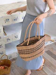 IN STOCK FAST SHIPPING FROM LOS ANGELES Get ready to tote your summer essentials in style with this handmade straw bag! Made from natural raffia, this bag features a charming daisy flower design and a large opening for easy access. The top handles make it a breeze to carry, perfect for a day at the beach or a picnic in the park. It's the ultimate combination of fashion and functionality. (Plus, it's totally handmade, so you know it's special.) Size: 8"H x 15"W x 5"D Designer Style ID: 8705 Summer Pouch Bags For Daily Use, Casual Large Capacity Rectangular Straw Bag, Large Capacity Rectangular Straw Bag, Casual Large-capacity Rectangular Straw Bag, Summer Daily Use Pouch Bag, Bohemian Straw Pouch Bag With Large Capacity, Casual Woven Beach Bag For Everyday Use, Casual Everyday Woven Beach Bag, Summer Rectangular Bucket Bag With Large Capacity