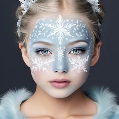 Capture the glacial beauty with this makeup featuring stunning blue tones, silver ornaments, and glittery accents for a glamorous North Pole-inspired look Blue Frosty Makeup, Winter Elf Makeup, Ice Fairy Makeup, Jack Frost Makeup Ice Queen, Frost Makeup Ice Queen, Princess Kids, Christmas Makeup, Silver Ornaments, Face Painting Designs