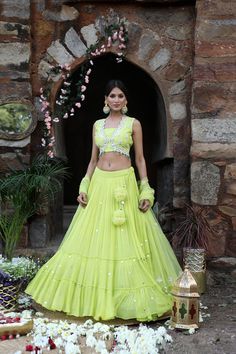 Featuring here neon green flared Lehenga Set with mirror, bead, zari work paired with net dupatta & mirror work blouse Fabric - Silk, Georgette, net Components - 3 Colour - Neon Green Embroidery details - Hand Embroidery Delivery time - 2-3 weeks Washing Instructions - Dry-clean Pista Green Gota Work Sets For Reception, Pista Green Sets With Gota Work For Navratri, Navratri Pista Green Set With Gota Work, Pista Green Palazzo Set With Mirror Work For Reception, Pista Green Sets For Reception Navratri, Pista Green Sets For Reception And Navratri, Pista Green Sets For Reception During Navratri, Pista Green Lehenga With Gota Work In Georgette, Pista Green Cutdana Party Choli