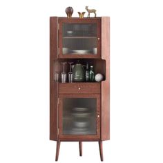 a wooden cabinet with glass doors and shelves on the bottom shelf, filled with dishes