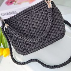 👜GENERAL FEATURES👜  FeyZolfey black crochet bag is produced from 100% polypropylene yarn. The overall dimensions of this women's shoulder bag are 20x18x8cm. The lining inside this black handbag is satin material and has one inner pocket. This quilted bag also offers sophisticated styling. This top handle purse has one knitted (85cm) shoulder strap and one crocheted short handle to allow you to wear it as a classic handbag. It also has a zipper closure system. These handmade luxury bags do not contain chemicals that may affect human health. ⭐A UNIQUE PIECE⭐  FeyZolfey knitted bag for ladies has a magnificent look thanks to its unique design. Summer bags for women, which have multiple uses, can be used daily, on the beach, at an invitation, or in areas such as school. Due to the perfect si Luxury Handwoven Black Shoulder Bag, Luxury Summer Crochet Top Handle Bag, Luxury Handwoven Black Bags, Luxury Black Crochet Bag For Summer, Luxury Black Crochet Shoulder Bag, Luxury Black Top Handle Crochet Bag, Luxury Black Handwoven Crochet Bag, Luxury Black Handwoven Shoulder Bag, Handmade Black Crochet Handheld Bag