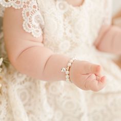 Handmade in the USA A sweet gift for your baby girl. When shopping for the perfect baby shower gift it will be difficult to find something else quite as classic as this white luster pearl bracelet with sterling silver heart charm. Arrives in an elegant laced lined metal box for a cute presentation. Also makes a perfect baptism or first birthday gift! White luster pearls Sterling silver heart charm **Please note that the bracelet should be worn under adult supervision and contains small parts** Baby Christmas Stocking, Heirloom Gifts, Baby Jewelry, First Birthday Gifts, Perfect Baby Shower Gift, Sweet Gifts, Create Outfits, Baby Boutique, Metal Box