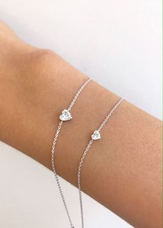 Sweet and simple with an extra special bit of love. Small solitaire heart is .21 ctw Large solitaire heart is .46 ctw Mother Daughter Jewelry, Bangle Ring, Jewelry Bracelets Gold, Jewelry Accessories Ideas, Heart Chain, White Gold Jewelry, Heart On, Diamond Sizes, Watches Jewelry