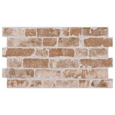 a white brick wall with brown and tan bricks