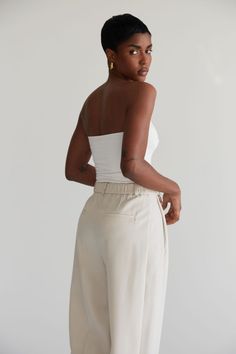 A minimal and simple strapless design, made from our signature double layered fabric, this top curves to the body to provide a sculpted silhouette. Perfect for any occasion, yet versatile enough to be styled with any bottoms. Summer Tube Top, Summer Tube, Summery Outfits, Layered Fabric, Summer Staples, Signature Collection, Dress Trousers, Tube Top, Summer Wardrobe