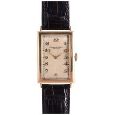 Vintage Swiss IWC rare mens Art Deco wrist watch, circa 1939. This watch features an 18 karat yellow gold case with an Art Deco dial, Breguet Arabic numerals, and restored original dial by the International Watch Company. The watch is marked Schaffhausen and has a rare highest grade hand made 19 jewel movement #679171, case #34661, calibration 10-1/2. Dimensions Case: 43mm H (lug tip to lug tip) x 25mm W (excluding crown) x 8mm D Warranty This watch comes with a full 18 month warranty from the date of purchase. Classic Yellow Gold Watch Bands With Rectangular Dial, Classic Jewelry And Watches With Rectangular Subdials, Classic Analog Watch With Rectangular Dial, Elegant Collectible Watch With Rectangular Dial, Classic Jewelry And Watches With Chronometer Rectangular Dial, Classic Analog Jewelry And Watches With Rectangular Dial, Classic Jewelry And Watches With Polished Rectangular Dial, Classic Jewelry And Watches With Rectangular Dial, Classic Collectible Watch With Rectangular Dial