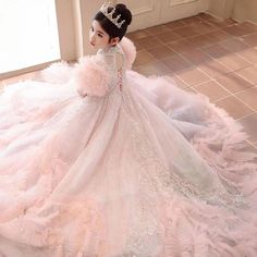 Introducing the Dreamy Luxury Dubai Girl Dress, perfect for weddings and birthday parties. Made with high-quality, beaded Arabric fabric, this pink dress exudes luxury and elegance. With its intricate details and dreamy design, your little girl will feel like a princess on her special day. Princess Style Tulle Floor-length Gown, Princess Style Floor-length Tulle Gown, Organza Ball Gown For Pageant, Princess Style Floor-length Quinceanera Gown, Princess Style Wedding Gown Floor-length, Organza Ball Gown For Pageants, Princess Style Floor-length Wedding Gown, Princess Style Floor-length Gown With Sweep Train, Princess Style Floor-length Gown For Debutante Ball