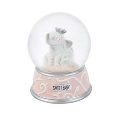 a snow globe with an elephant inside on a pink and white base that says sweet baby