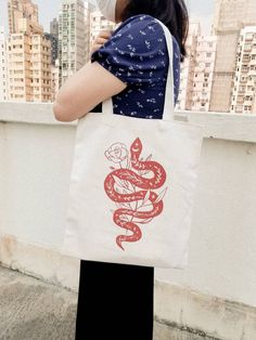 Welcome to my shop!🌙 I like to handmade some earrings and necklace in my free time.  💛Boho Celestial Snake Tote Bag 💛There is a inner pocket with zipper in each bag 🧡Handmade tore bags, there will be a slightly different between each one 💚Tote bags size 34CMx40CM 💜We suggested to clean it with alcohol spray or hand wash it to avoid the pattern might being washed out each time you wash it. 🍋Shipping and Delivery🍋 🌟Since there is a pandemic, it may take a little longer to arrive. Please note this before purchasing🌟 🌟You can upgrade the shipping for faster shipping in your basket 🌟 Bohemian Everyday Canvas Bag, White Handmade Bohemian Canvas Bag, Bohemian Canvas Bag For Gift, Bohemian Canvas Shoulder Bag Gift, Bohemian Canvas Shoulder Bag As Gift, Bohemian Canvas Bag Gift, Bohemian Shoulder Canvas Bag For Gifts, Bohemian Shoulder Canvas Bag, White Bohemian Canvas Bag For Daily Use