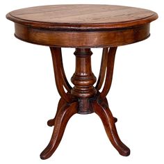 A beautiful finely carved British Colonial wooden circular side table with a pedestal leg. 1800s Furniture, Colonial Coffee Table, Colonial Table, Round Antique Side Table, Circular Side Table, Wolf Child, Anyique Side Table, Triangle Coffee Table, Wabi Sabi Coffee Table