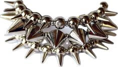 Punk Style Spiked Choker, Punk Style Spiked Choker Jewelry, Rock Style Spiked Party Jewelry, Rock Style Party Jewelry With Spikes, Rock Style Spiked Jewelry For Parties, Rocker Style Festival Choker Jewelry, Silver Adjustable Punk Choker, Spiked Choker For Concerts, Concert Choker With Spikes