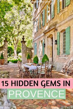 an outdoor patio with tables and chairs in front of a building that says 15 hidden gems in provence